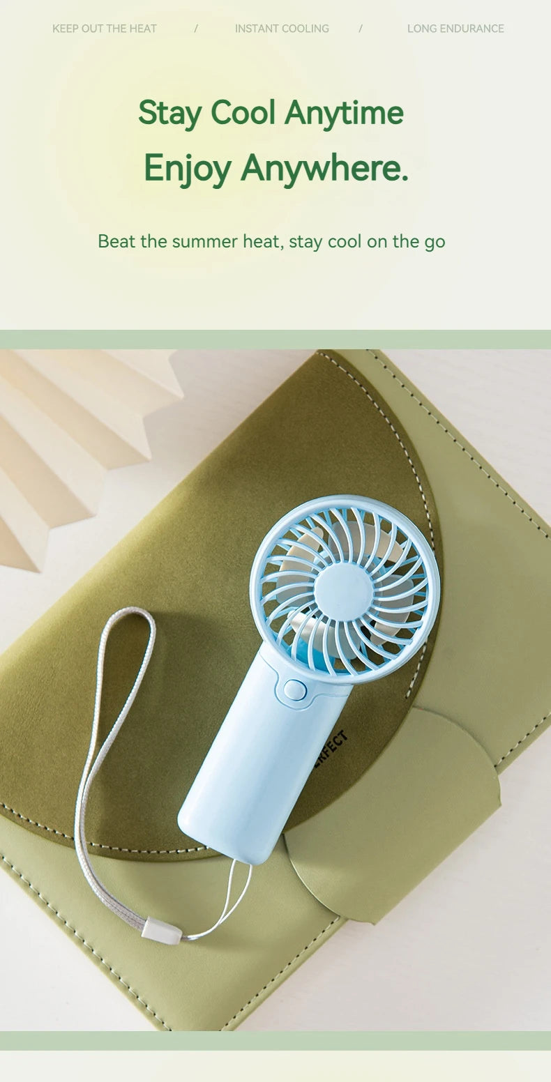 Portable Handheld Mini Fan for Summer Cooling Compact Desk Fan with Strong Airflow Simple Design Ideal for Outdoor travel Use